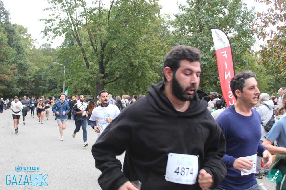 Last year's Gaza 5K finish photograph; Bayadse's bib 4874 is visible in the foreground